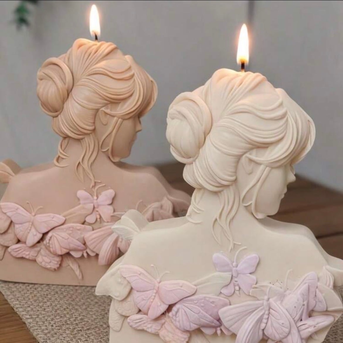 Butterfly bust candles in blush and cream