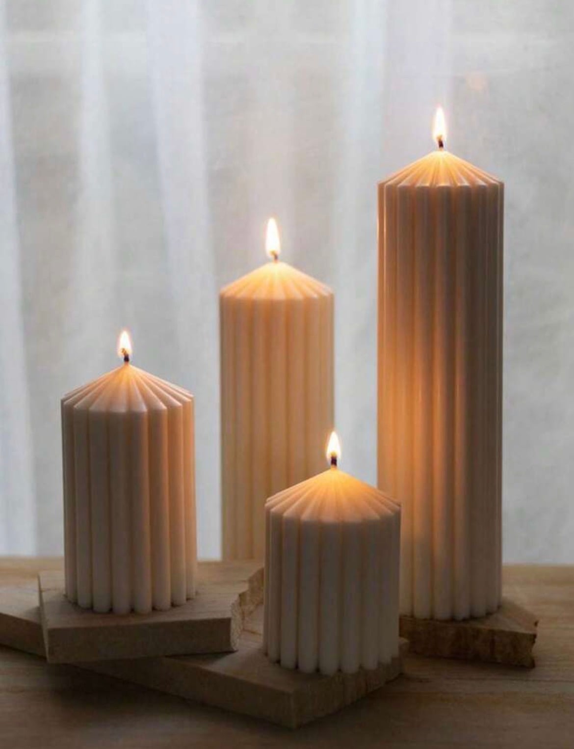 Fluted pillar candles with starburst tops