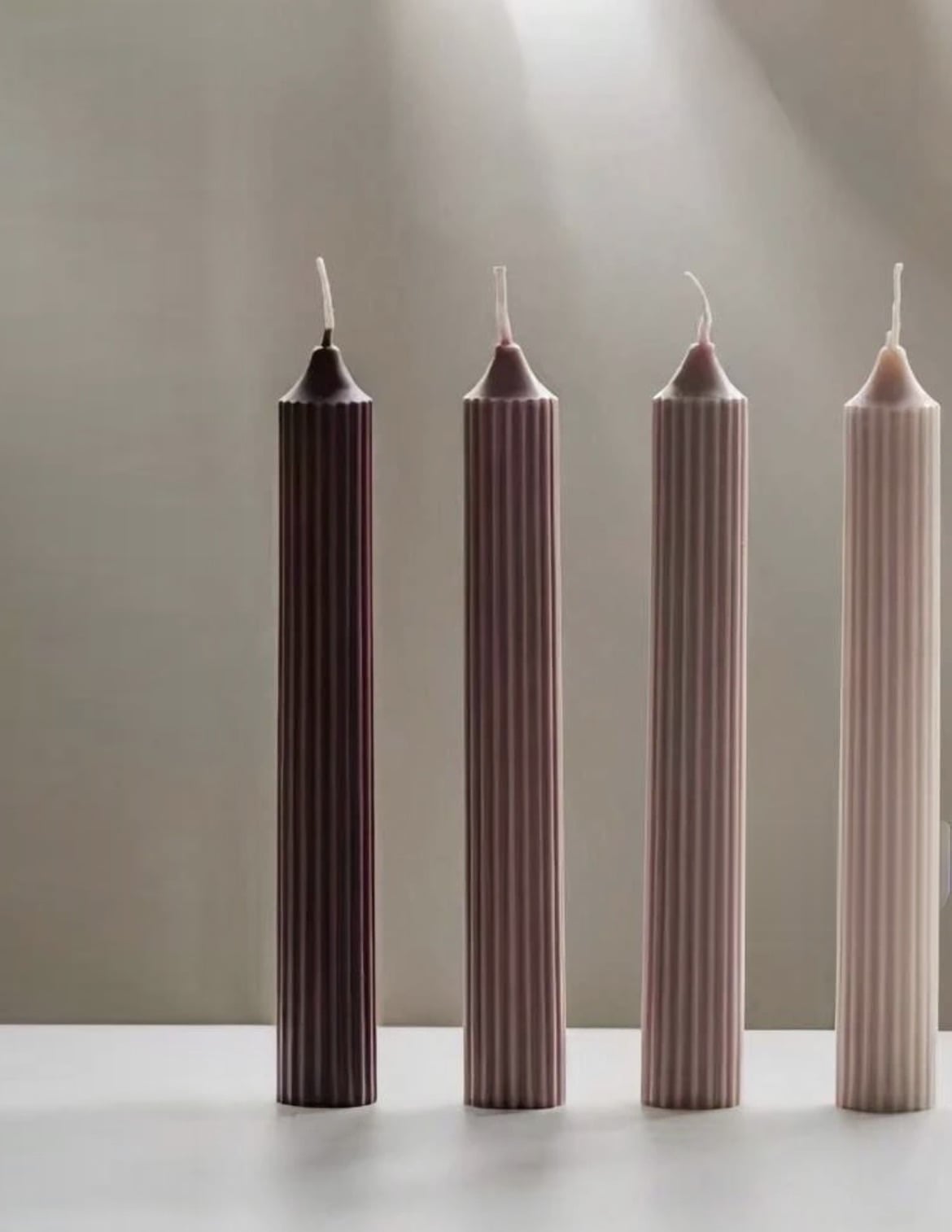Graduated ribbed tapers, mauve to blush