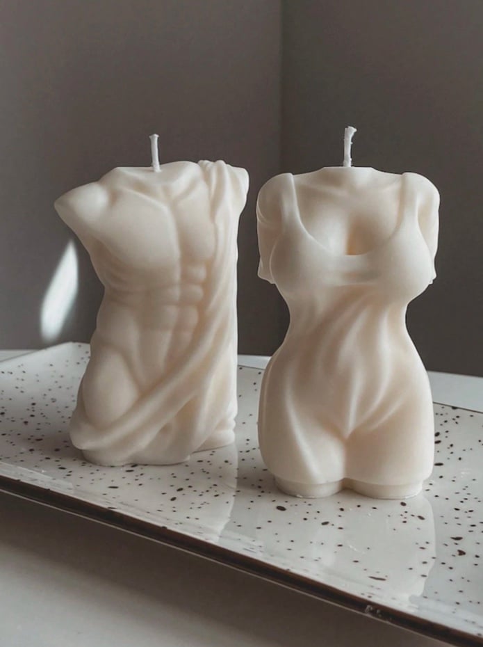 Sculptural figure torso candle in cream wax