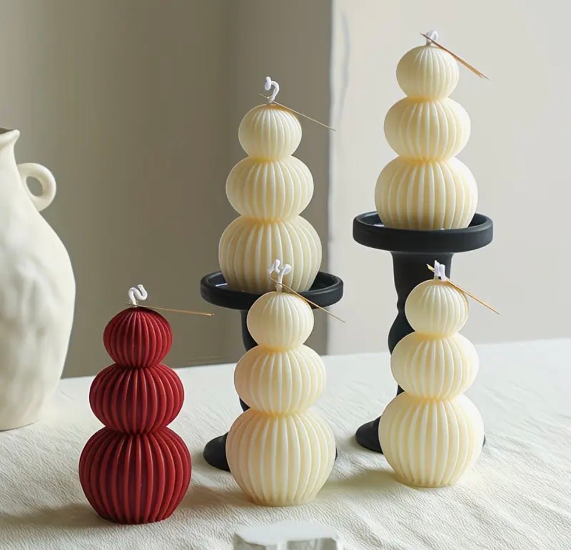 Stacked triple-sphere ribbed candle, hand-poured in soy, beeswax and coconut wax