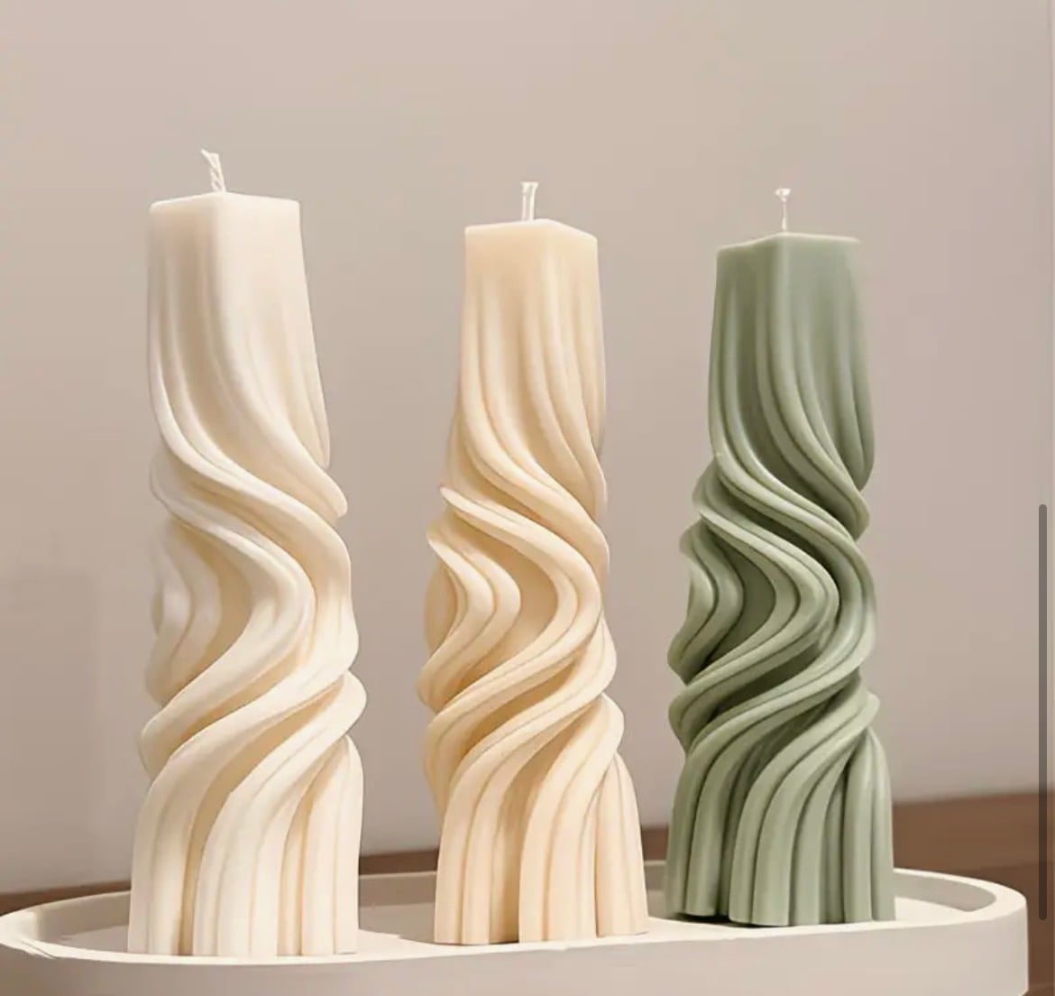 Twisted wavy pillar candles