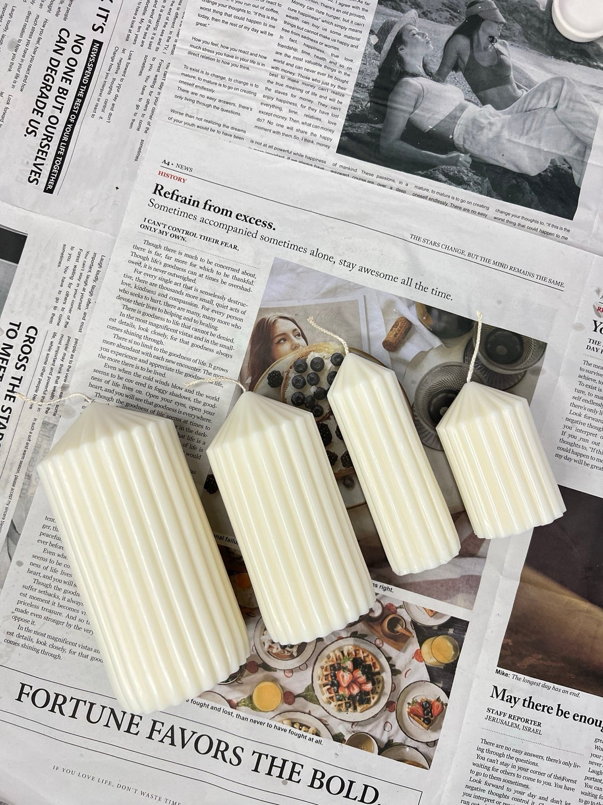 Fluted pillar candles with starburst tops, hand-poured in soy, beeswax and coconut wax