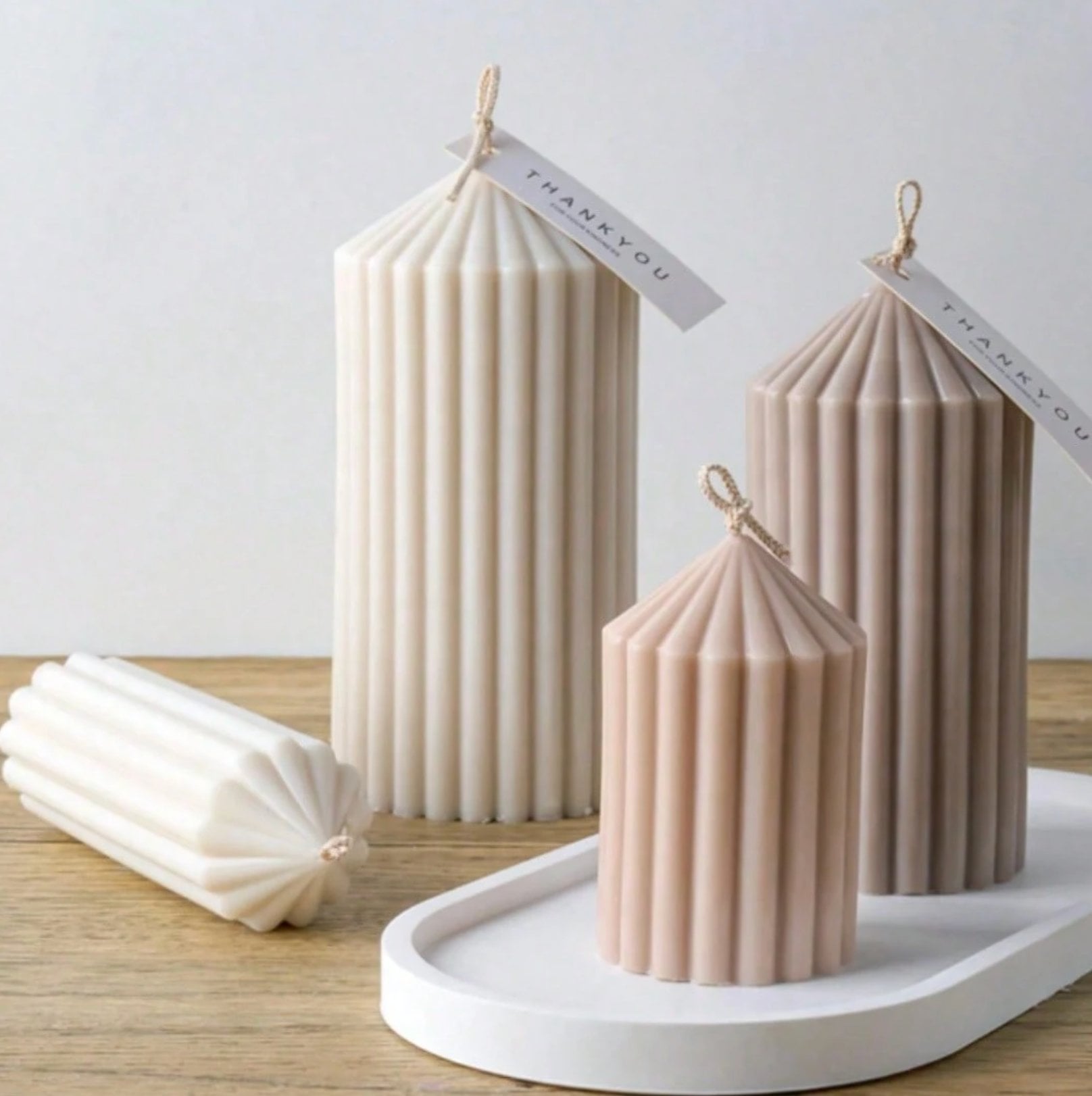 Fluted pillar candles with starburst tops, hand-poured in soy wax